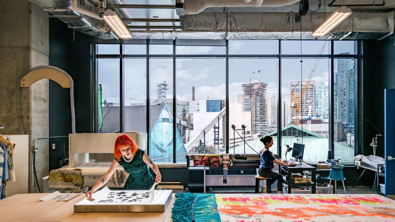 Interior of Launchpad with view of the city through the window