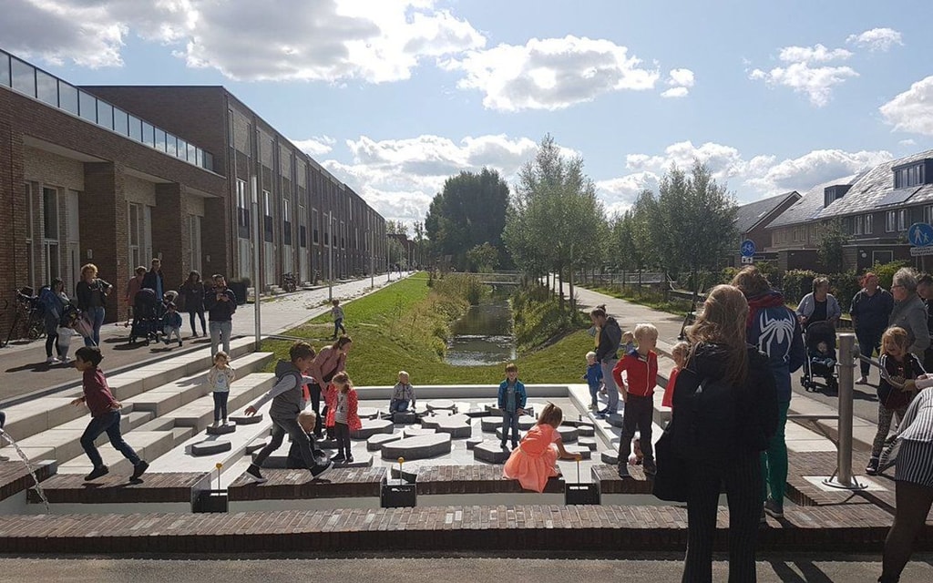 Children learning through doing children can control water levels in the playground children outside children playing
