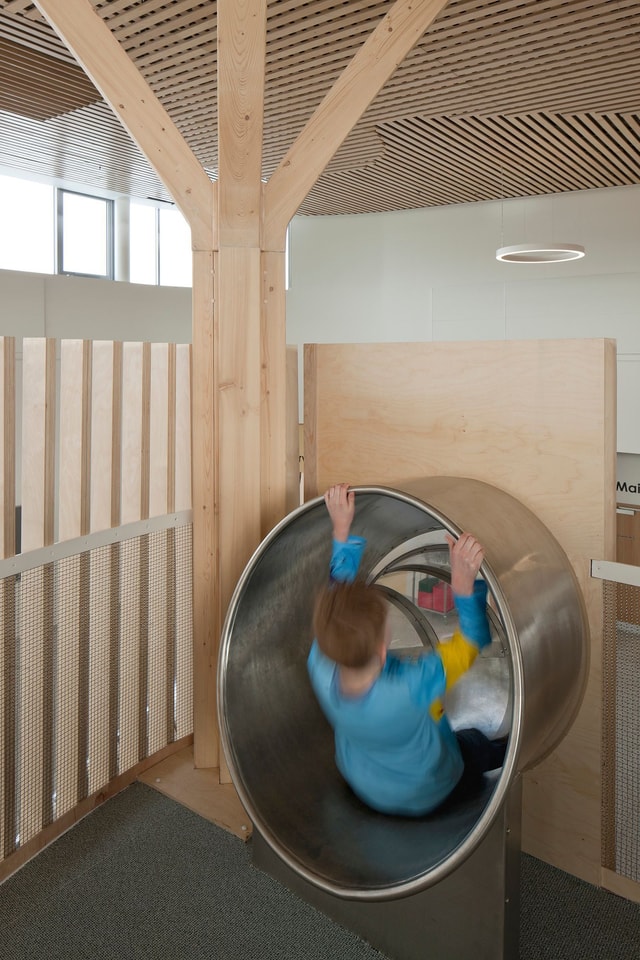 Newmains and St Bridig - child entering the top of the slide