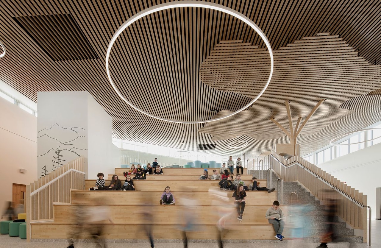 Newmains and St Bridig school interior atrium stairs with children