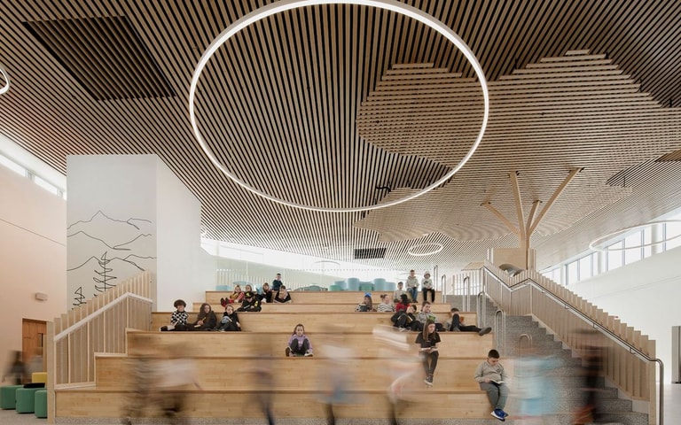 Newmains and St Bridig school interior atrium stairs with children