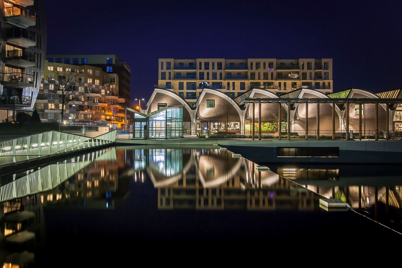 Paleiskwartier den bosh night time lights industrial buildings have been repurposed as amenities for the community