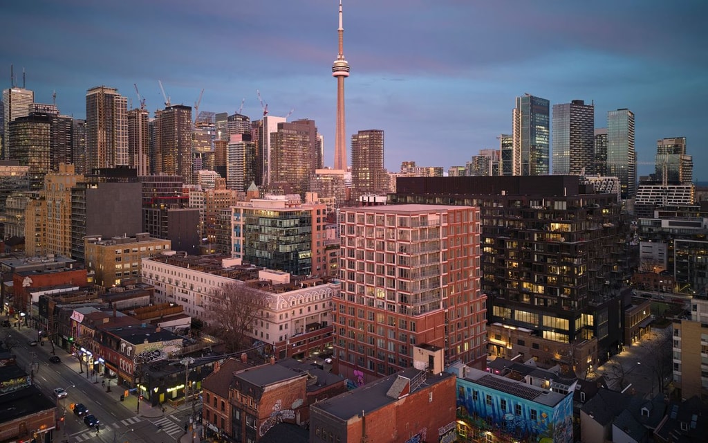 Rush Condos Exterior Arial Image at Sunset
