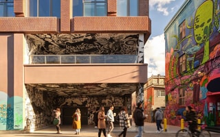Rush condos Building from the ground floor straight on with graffiti